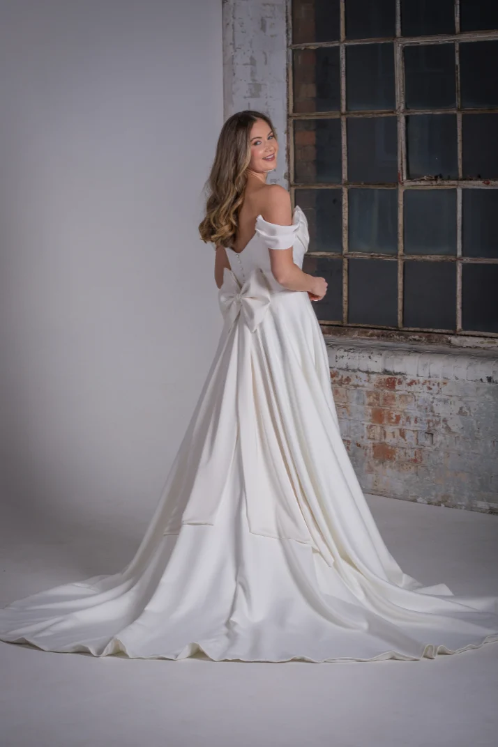 Cayla+Satin+Wedding+Dress+with+detachable+swags+and+bow+back+Orchid+Collection+Natalya+James+2025-333.png